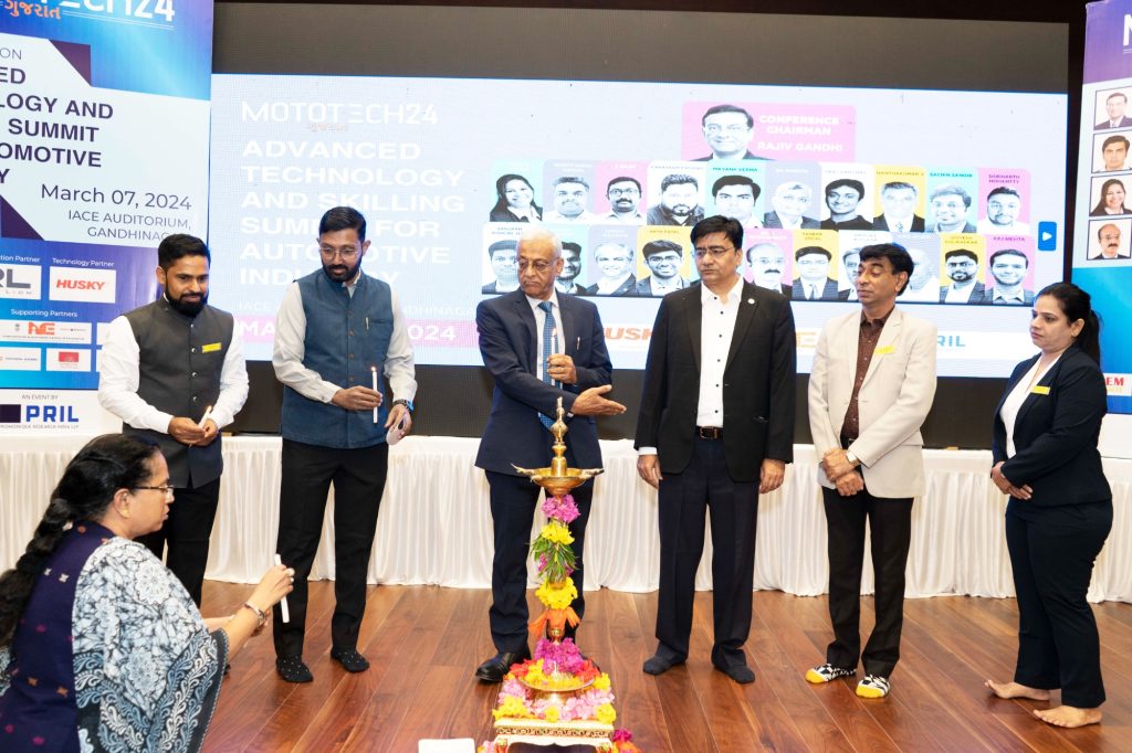 Lamp Lighting by Dignitaries Mr. Rajiv Gandhi, Mr. E Rajiv, Ms. Radha Poptani, Mr. Sameer Jindal, Mr. Sagar Tamhane and Mr. Prasad Nair in iACE Mototech24 Gujarat.